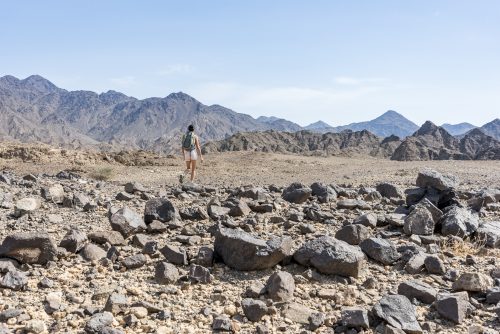 Woman trekking in a Wadi (Dry mountains) of Showka, RAK, UAE 🇦🇪