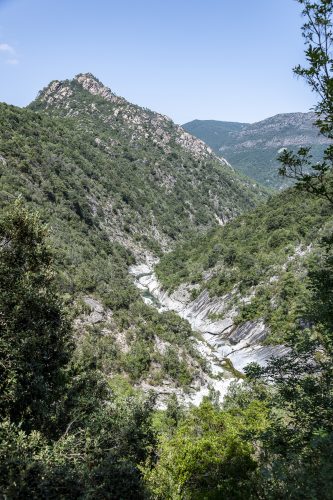 River with natural pools and forest of Travu valley. Chisà, Corsica, France