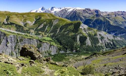 Scenic view of the Ferrand Valley in the Alps with LA MEIJE glacier in the background and with both villages Besse and Clavans-enHaut (left and bottom right), Oisans, Isere, France
