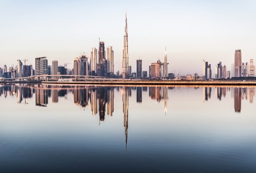 Dubai, United Arab Emirates. January 19th, 2018. clear weather on Dubai at sunrise United Arab Emirates. Buildings of the city reflecting on the water canal. United Arab Emirates, Middle East, Arabian Peninsula