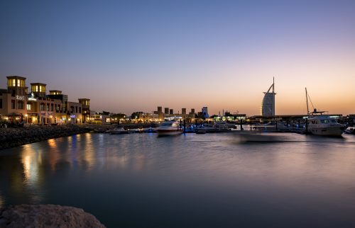 View of "Al Souq", Fishing Harbor, Dubai. It’s an area where you can eat, drink, stroll among the boats and enjoy the fresh breeze from the sea, and meet the heart of Dubai, the old Emirati fishermen.